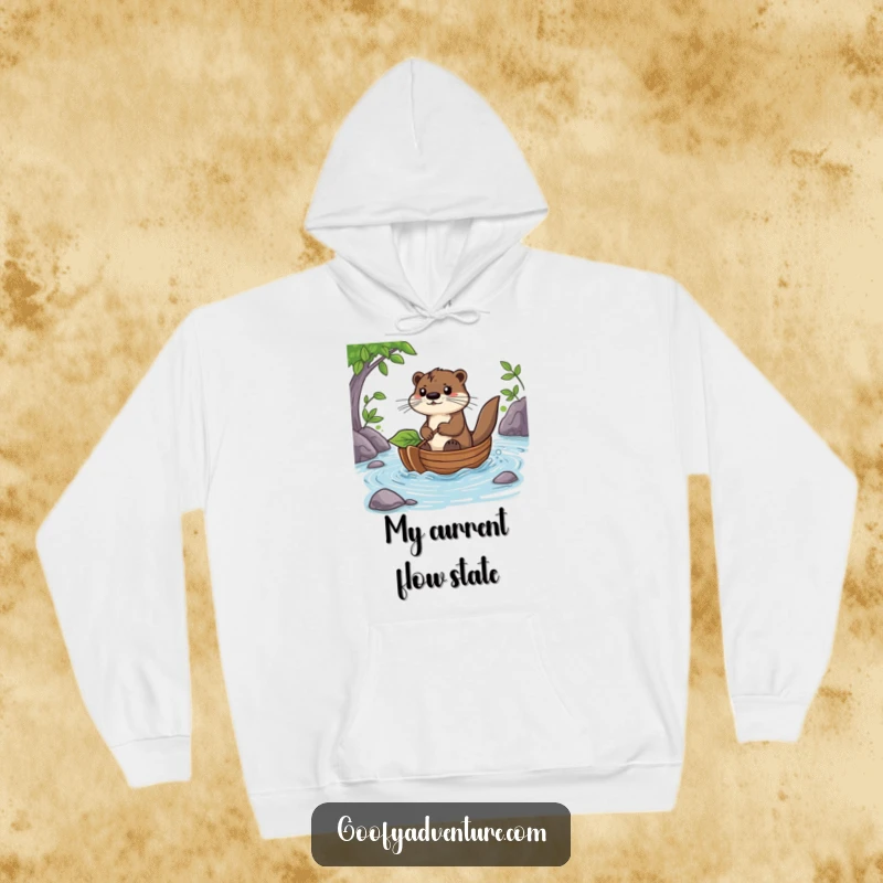 Funny Otter Hoodie: A determined otter bravely steers a leaf boat on a river, embodying courage and a love for adventure.