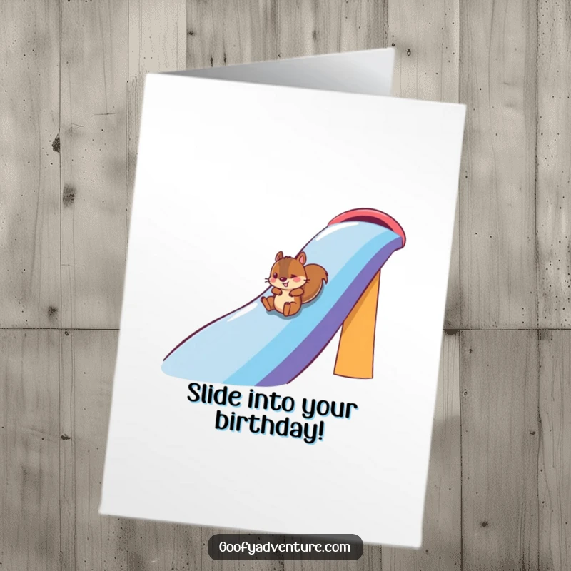 Funny Free Printable Birthday Card: A playful squirrel slides down a massive rainbow, bringing vibrant birthday cheer and excitement.