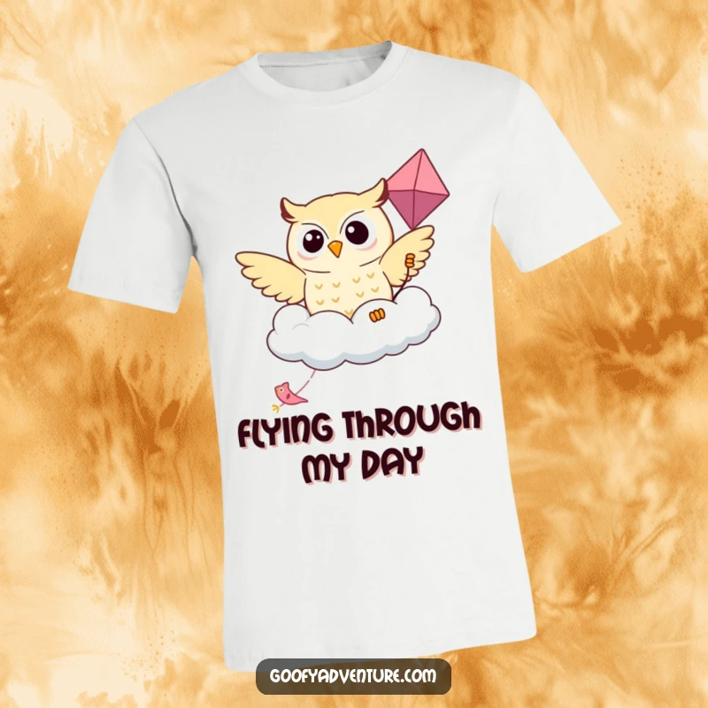 Funny Kawaii owl soaring gracefully on a kite shaped like a friendly cloud, printed on a fun t-shirt.