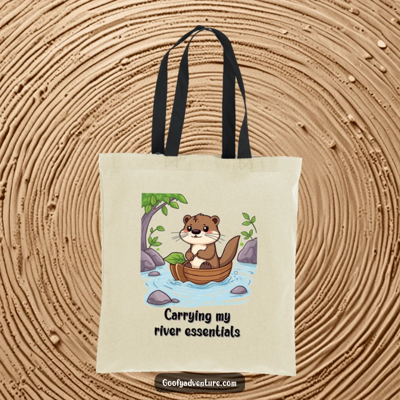 Funny Otter Tote Bag: A determined otter confidently pilots a leaf boat down a river, ready for any journey.