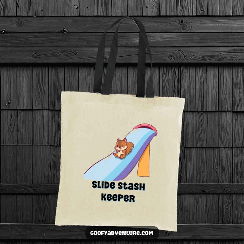 Funny squirrel character sliding down a vibrant rainbow on a durable tote bag, perfect for carrying essentials, funny gift.